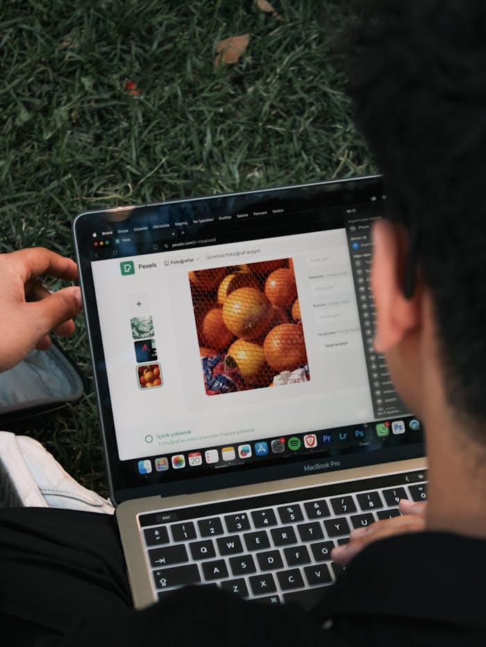 pexels-photo-26694146 Man Sitting and Watching Picture of Fruit